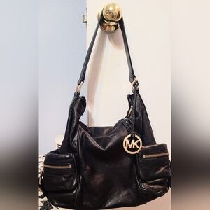 Used, in good condition MK leather shoulder/handbag.